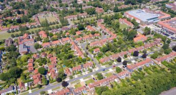 Aerial photo of the British town of Stevenage in Hertfordshire UK showing a typical British housing estate with rows of houses in the village