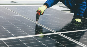 installation of solar panels on large rooftop