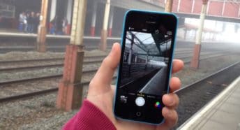 Rail tracks at a local train station, viewed on a mobile phone
